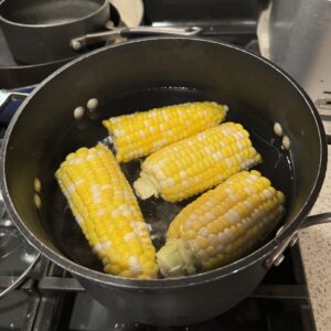 Corn on the cob in hot water